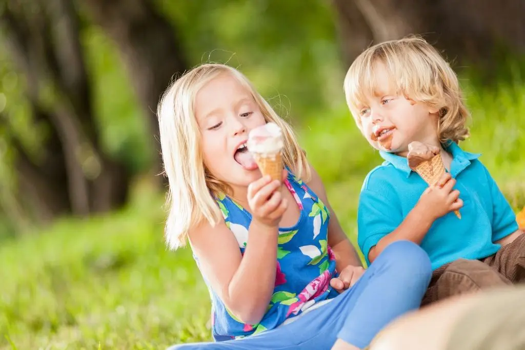 kids eating ice cream at park