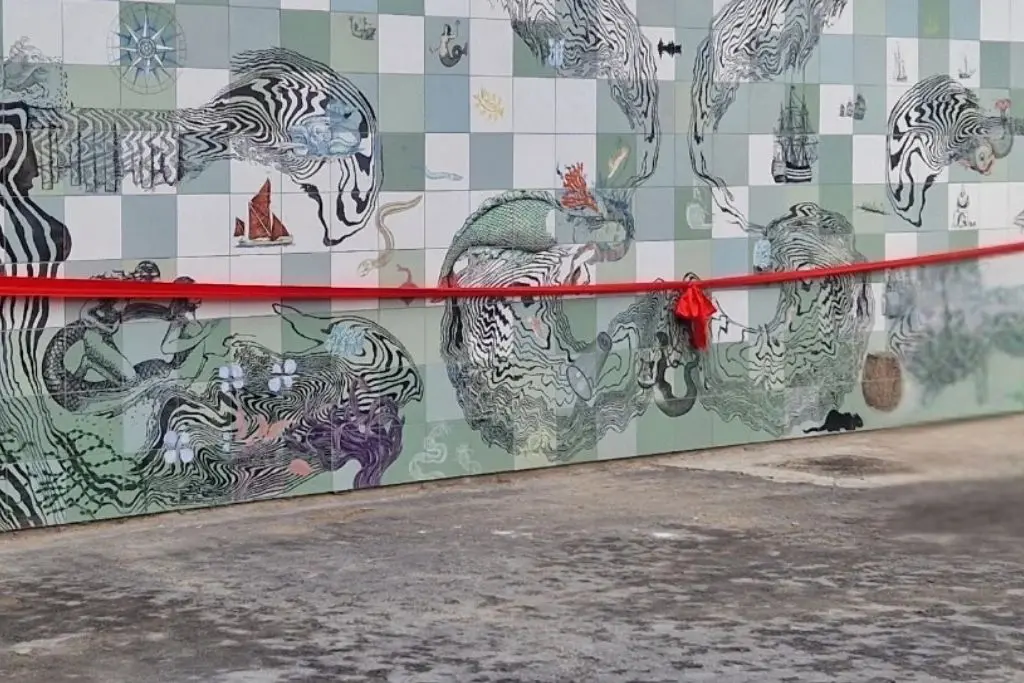 Red Ribbon inaugurating Chatham Landmark Striking Mural