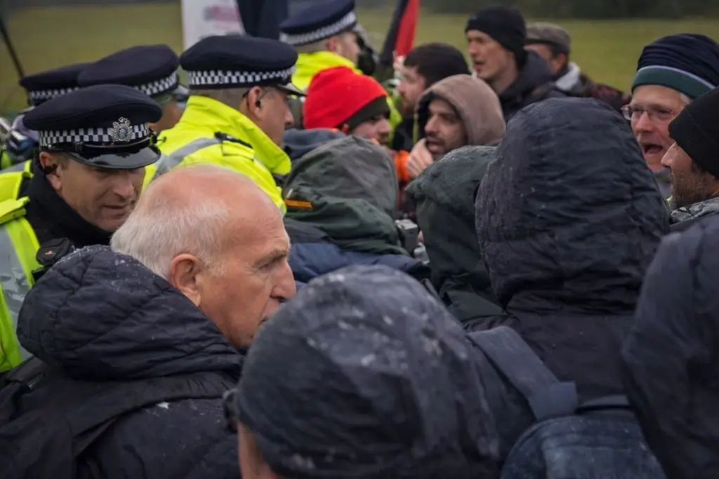Police and rallyist altercation at the Instro Precision factory in Sandwich.